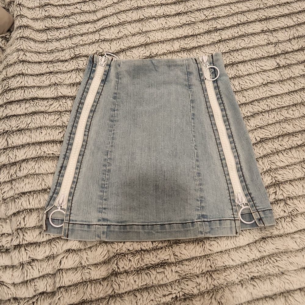 Light wash Carmar jean skirt with zip down sides size 23